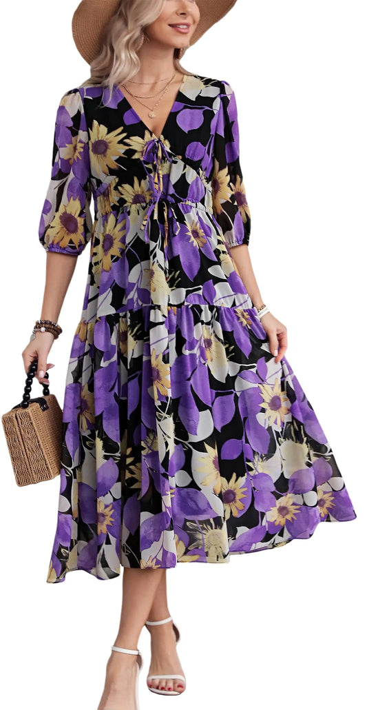 The Kormei Floral Maxi Dress brings effortless boho charm to every sunny moment.