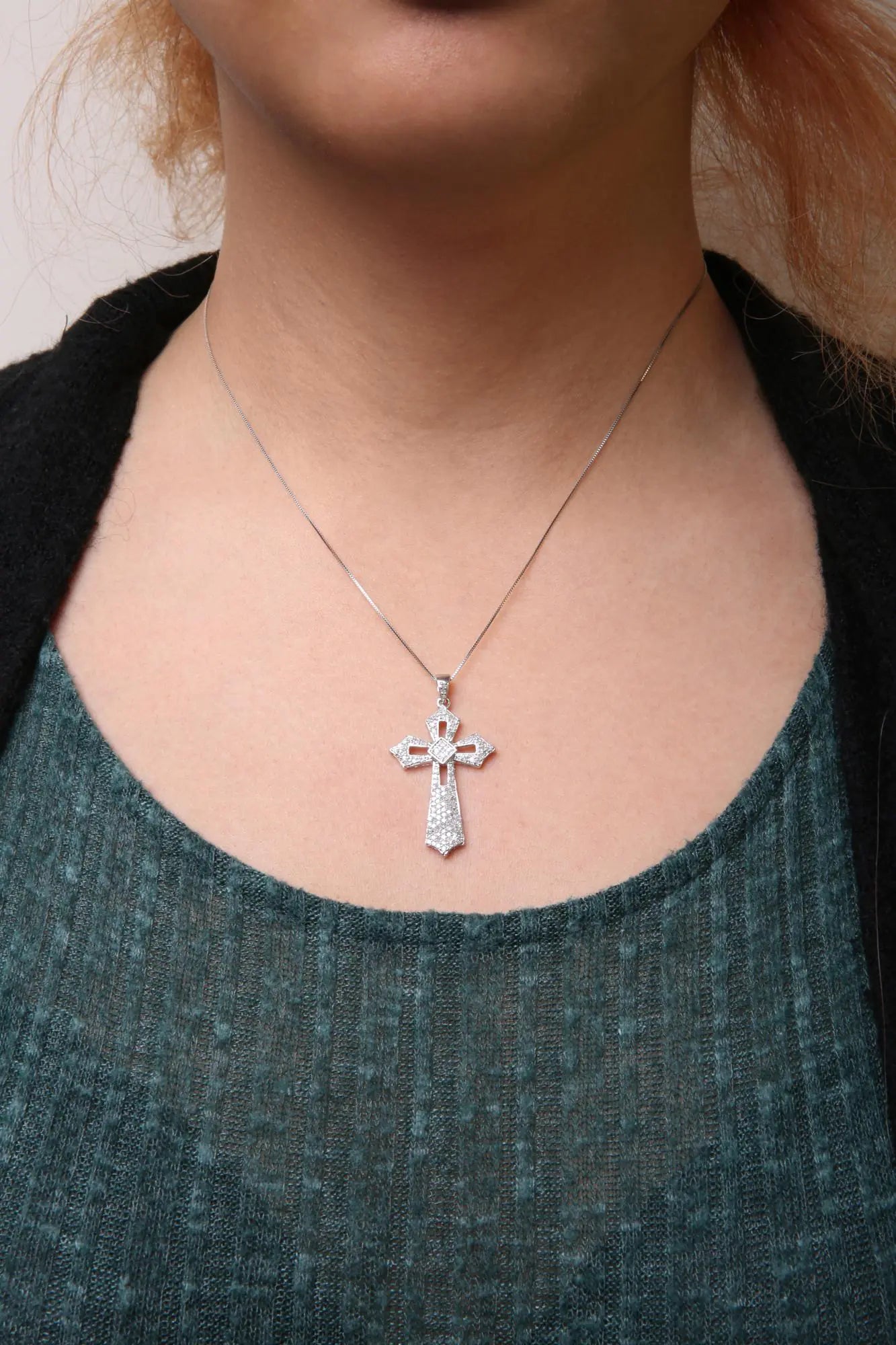 A radiant blend of elegance and faith in sterling silver and diamonds. - Glide Goods LLC